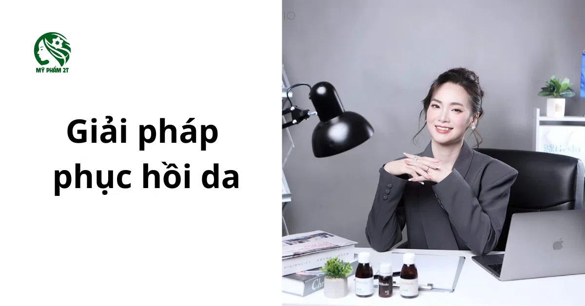 A Woman Sitting At A Desk With Her Hands Folded